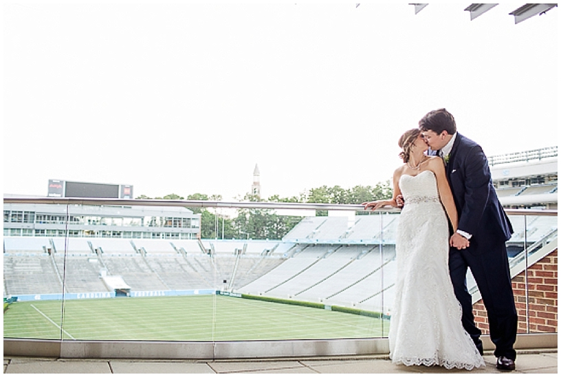 the blue zone bride and groom at kenan stadium 